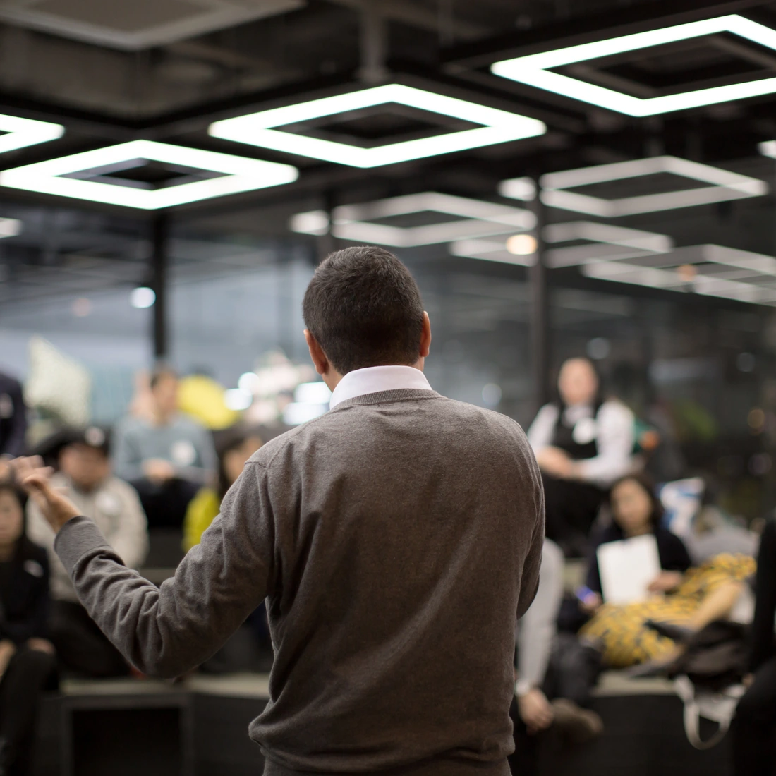 Business presentation to a group in a modern conference space