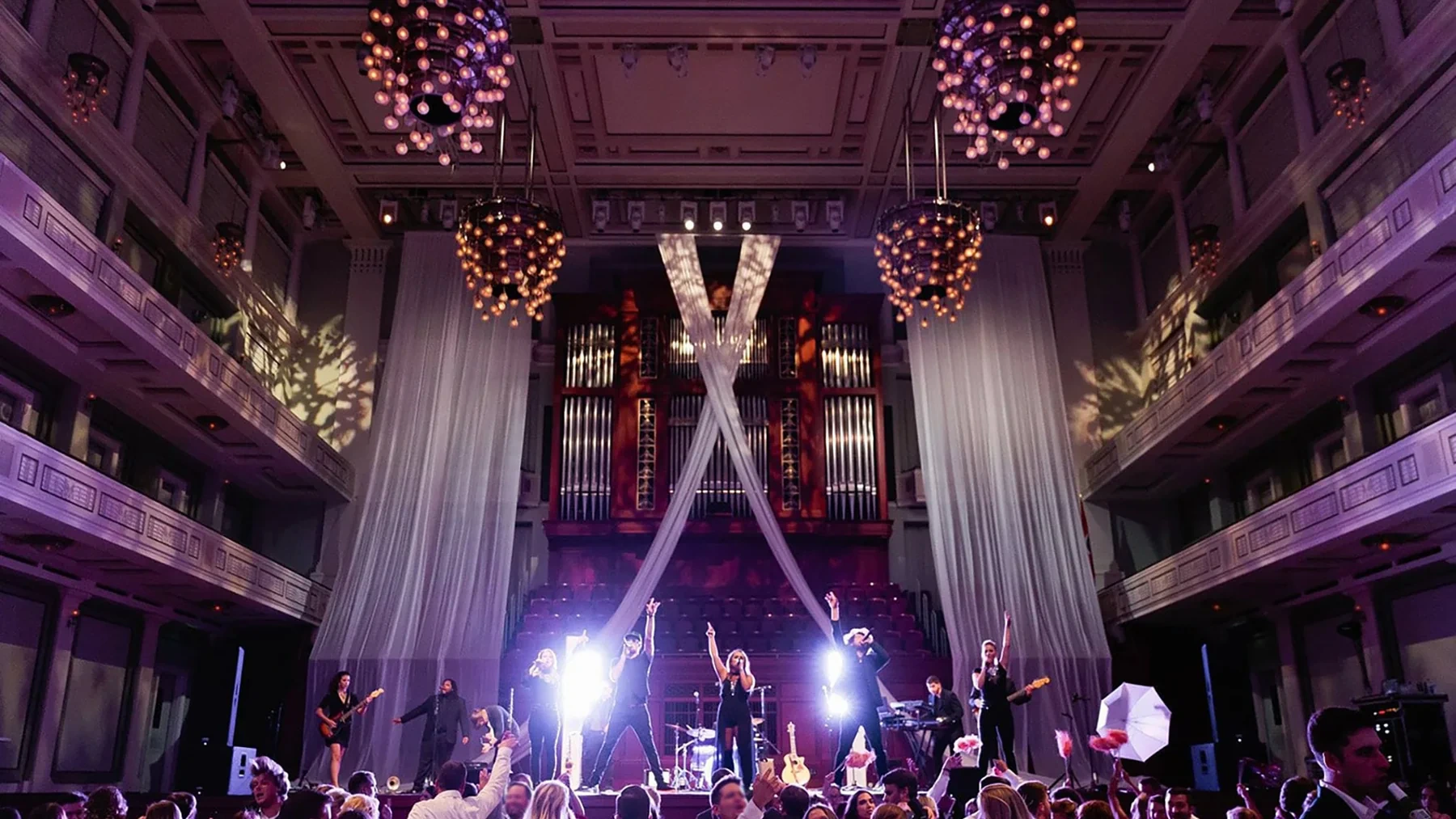 Quest Events ceiling drapery and lighting at a live event