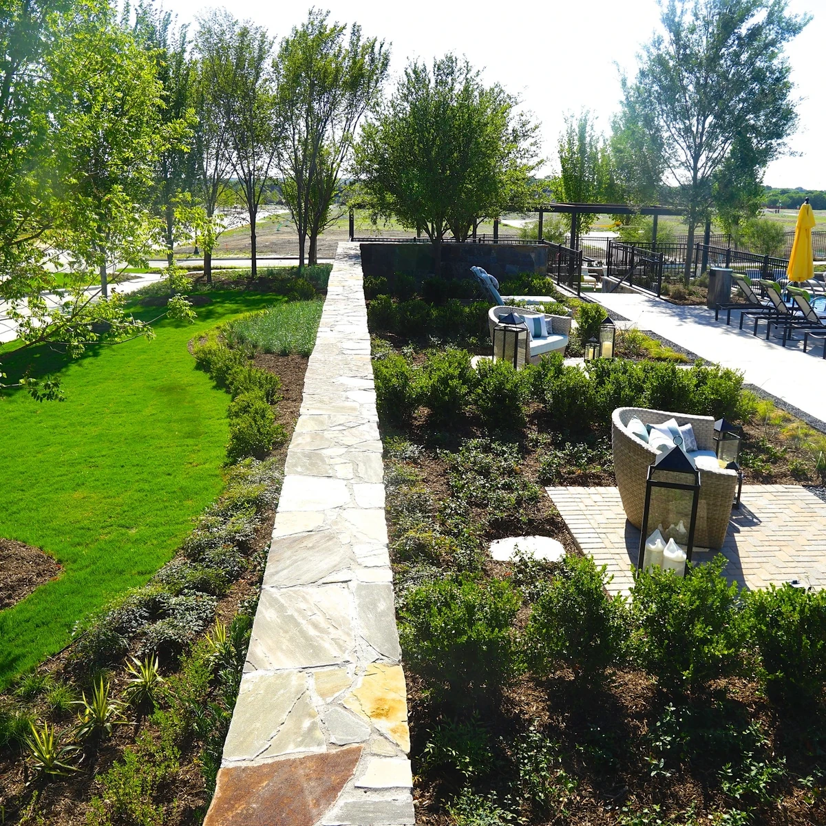 Superscapes landscaped grounds with trees, pathways and planting beds
