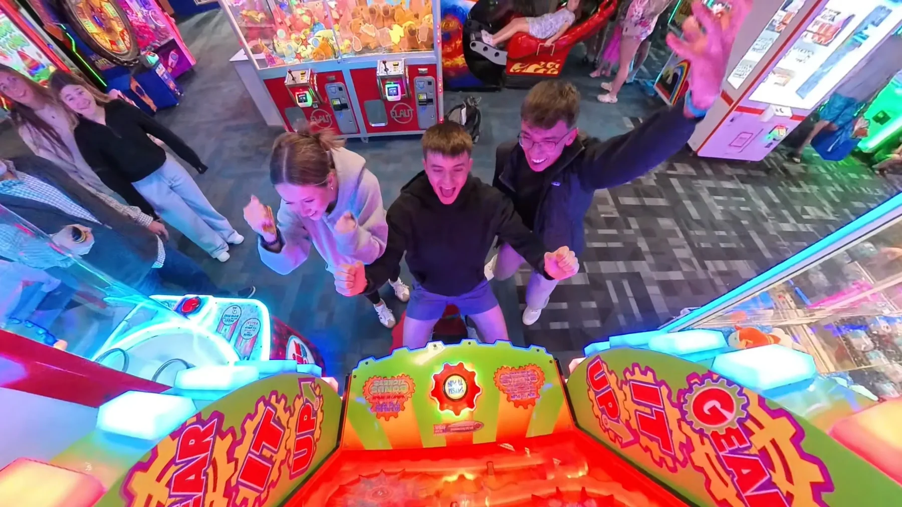 Families enjoying an arcade game
